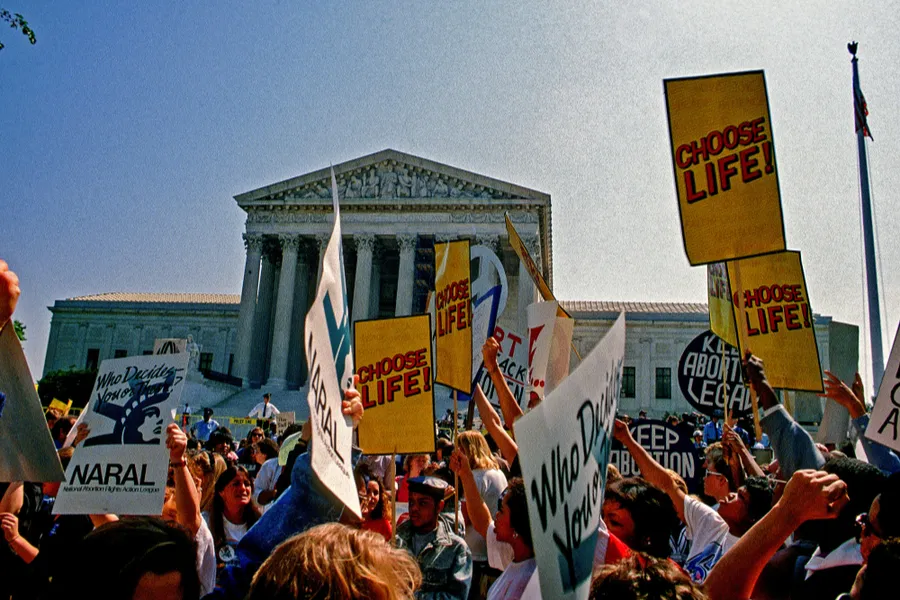 Supporters for and against legal abortion face off during a protest outside the United States Supreme Court. ?w=200&h=150
