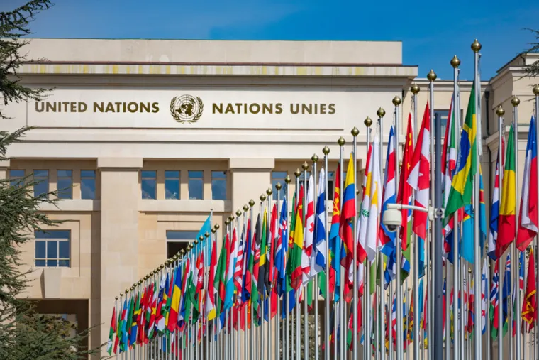 United Nations Building and the flags in Geneva Switzerland. Credit: Nexus 7/Shutterstock