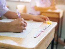 Students taking a test. 