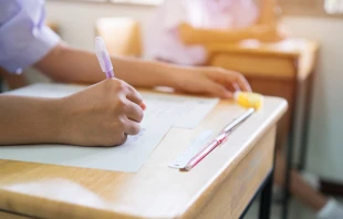 Students taking a test.   smolaw/Shutterstock