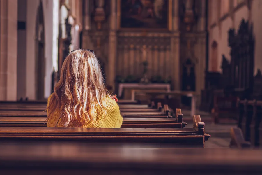Woman alone in empty church. ?w=200&h=150