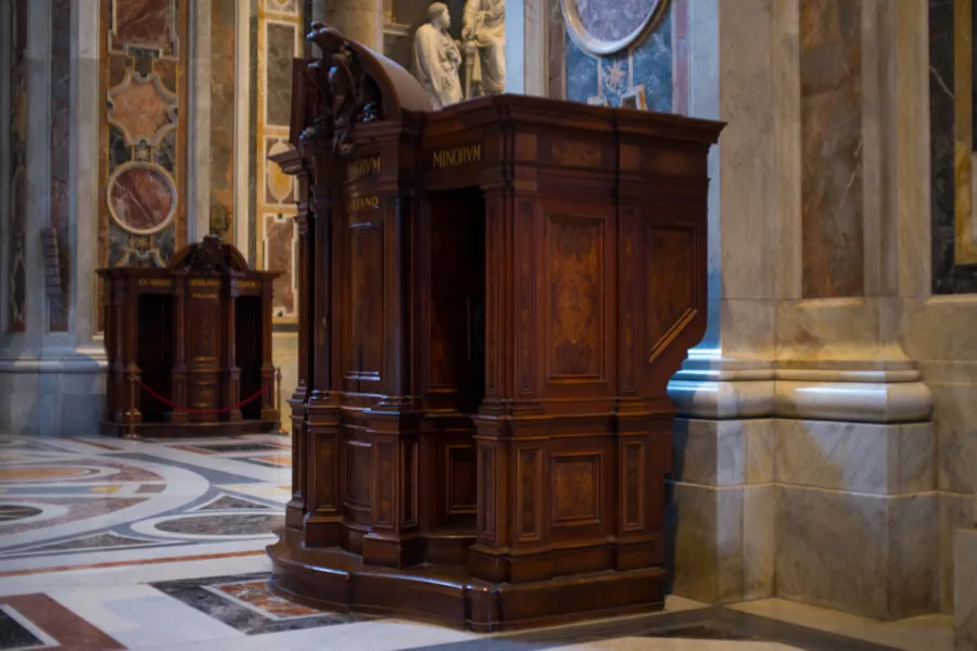 Confession booth in St. Peter's basilica in the Vatican. Via Shutterstock.?w=200&h=150