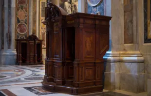 Confession booth in St. Peter's basilica in the Vatican. Via Shutterstock. 