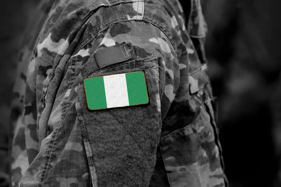 The flag of Nigeria on a soldier’s arm.?w=200&h=150