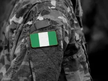 The flag of Nigeria on a soldier’s arm.