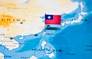 Flag on Taiwan on a world map.   hyotographics/Shutterstock