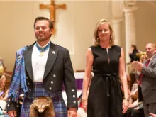 Medal of Honor recipient Edward Byers Jr and Robin King walk runway for a charity fashion show in April, 2019 at Church of the Holy Apostles, NY. 