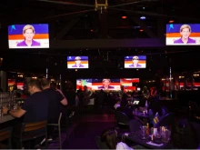 Senator Elizabeth Warren on the TV screens debating. Election 2020. 