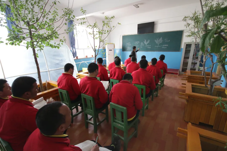 Uighurs learn gardening at "reeducation camp" in Moyu County, Hotan Prefecture in Xinjiang. ?w=200&h=150