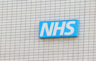 NHS National Health Service sign UK. TK Kurikawa/Shutterstock