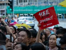 Hongkongers march on streets of Tsim Sha Tsui in Kowloon, July, 2019. 