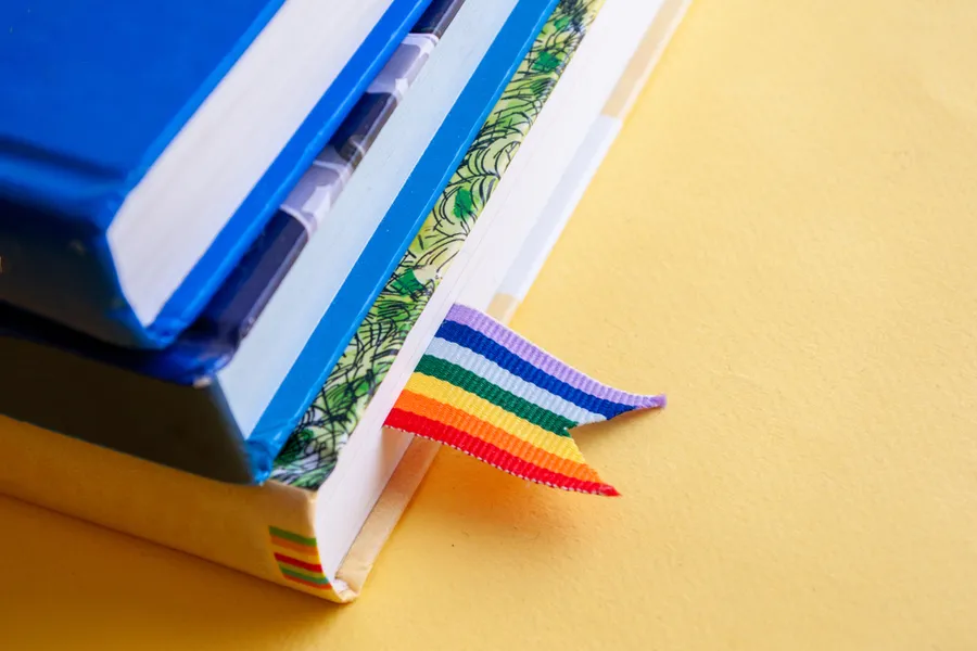Stack of three books with rainbow ribbon bookmark. ?w=200&h=150
