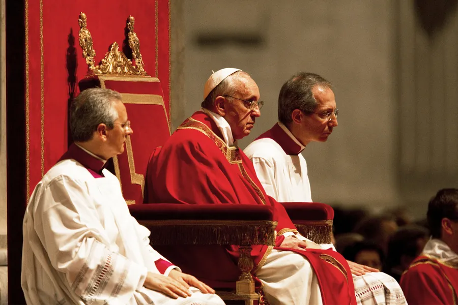 Pope Francis praying during an evening Good Friday service in St Peter's Basilica, 2013. ?w=200&h=150