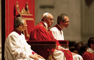 Pope Francis praying during an evening Good Friday service in St Peter's Basilica, 2013.   Philip Chidell / Shutterstock