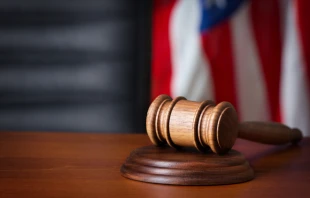 Gavel on judicial desk. Stock image via Shutterstock