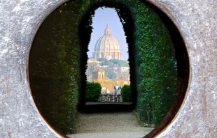 St. Peter's Basilica from the keyhole on Aventino Hill, Rome Italy. Via Shutterstock 