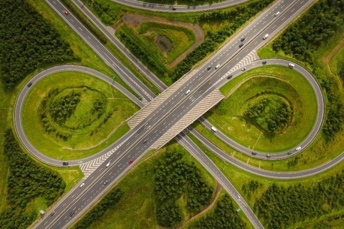 An aerial view of the M7 motorway and N18 national road junction on the outskirts of Limerick, Ireland.