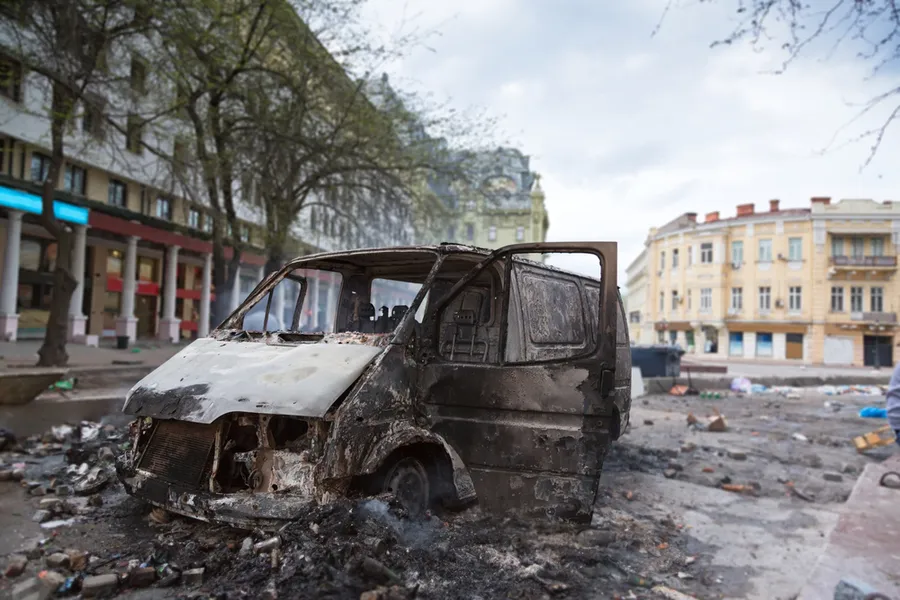 Burned car in the center of city after unrest in Odesa, Ukraine. ?w=200&h=150