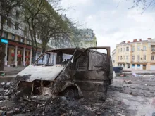 Burned car in the center of city after unrest in Odesa, Ukraine. 
