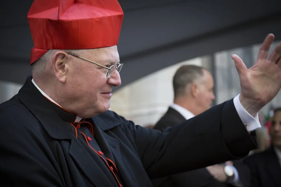 Timothy Cardinal Dolan Archbishop of New York waves to parade marchers in front of St Patricks Cathedral on Saint Patricks Day in Manhattan on March 17, 2016. ?w=200&h=150