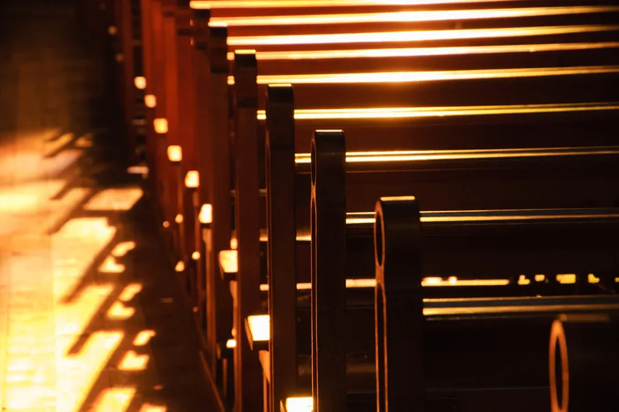 Rows of pews in a church building. ?w=200&h=150