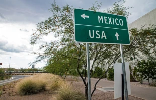 Signpost at the US-Mexican border.   ChessOcampo/Shutterstock