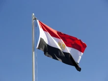 The national flag of Egypt.