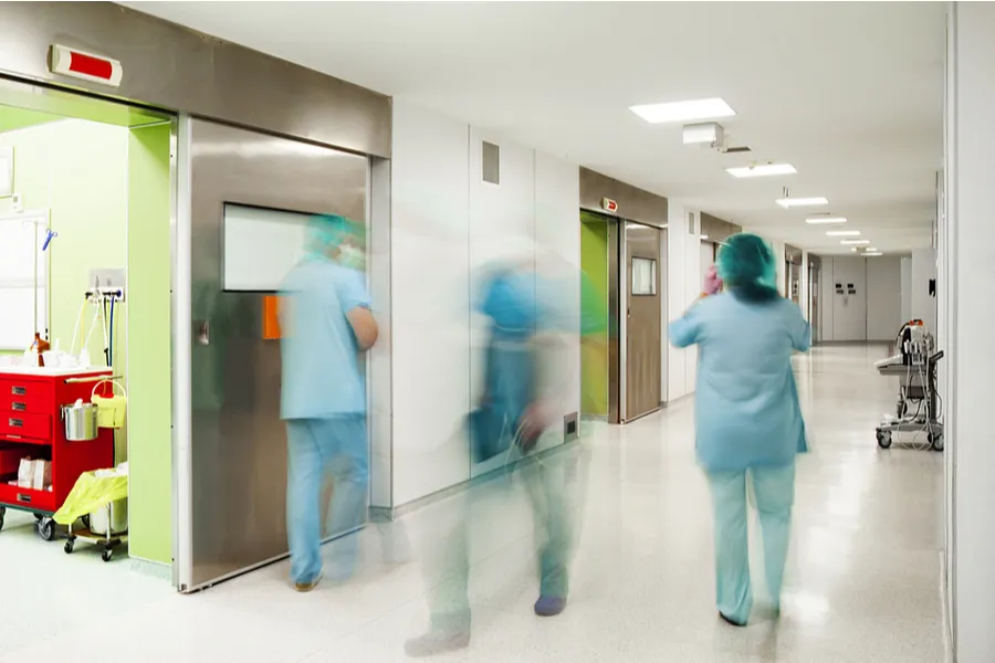 Blurred hospital hallway. Stock image, Shutterstock.?w=200&h=150