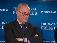 Senate Minority Leader Chuck Schumer speaks to a press conference at the National Press Club. 