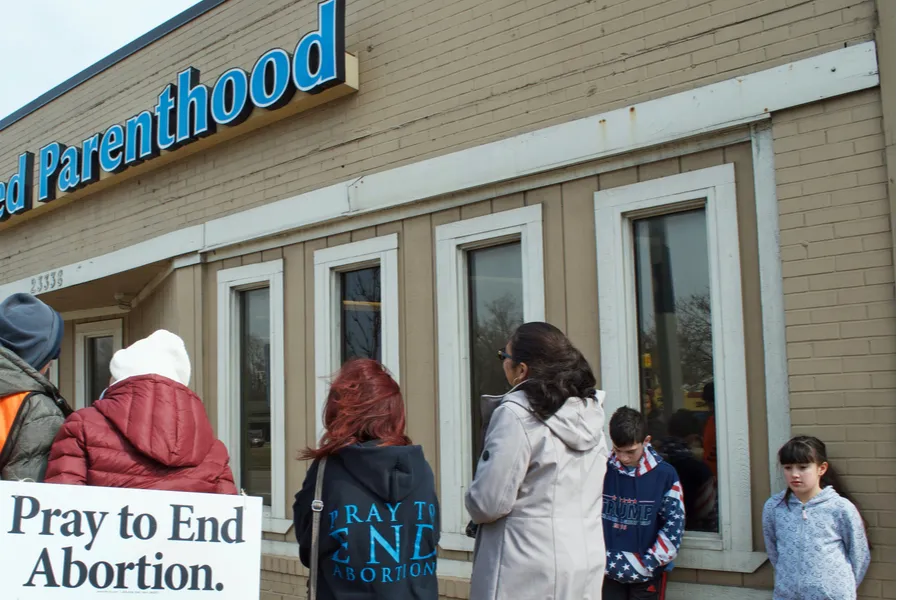 Pro-life volunteers pray outside a Planned Parenthood facility in 2017. ?w=200&h=150