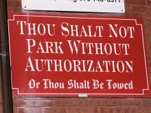 Novelty sign in church parking lot. 
