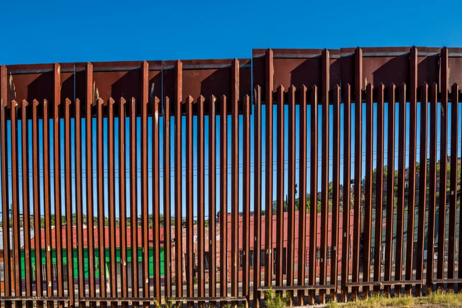 Closeup of border fence between US and Mexico in Nogales, Arizona. Via Shutterstock.?w=200&h=150