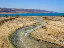 Jordan River flowing to the Dead Sea. 