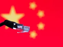 Ethernet cable with chinese flag in the background. 