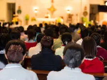 Catholics attending Mass. Stock photo/Shutterstock