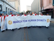 Participants march at a rally for immigrants and refugees at the Diocese of El Paso on Monday, March 24, 2025.