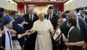 Pope Leo XIV greets religious sisters and patients at the De La Croix Hospital for the mentally disabled in Jal el Dib, north of Beirut, Lebanon, on Dec. 2, 2025.