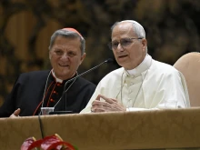 Pope Leo XIV sits next to Cardinal Mario Grech, general secretary of the Vatican’s synod office, during the Jubilee of Synodal Teams and Participatory Bodies in the Vatican’s Paul VI Hall on Oct. 24, 2025.