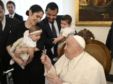Pope Francis greets members of the Gaudium Et Spes Foundation at the Vatican on Feb. 14, 2025.
