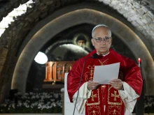 Pope Leo XIV reflects on the enduring message of St. Charbel Makhlouf at the hermit’s tomb at the Monastery of St. Maron in Annaya, Lebanon, on Dec. 1, 2025.