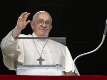 Pope Francis waves to pilgrims on All Saints' Day in St. Peter's Square, Nov. 1, 2023.