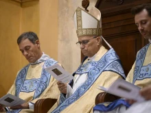 Pope Leo XIV joins the Australian community for evening prayer at Domus Australia Catholic Chapel in Rome on Monday, Oct. 6, 2025.