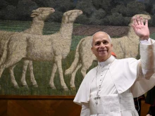 Pope Leo XIV waves to those gathered at the Pontifical Lateran University in Rome on Nov. 14, 2025.