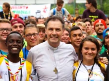 The 10th successor of St. Don Bosco to the Salesians, Cardinal Ángel Fernández Artime, along with young people from the Salesians. |