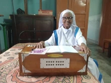Sister Mary Amiya plays her Harmonium at Shanti Bhabon in Gazipur, Sept. 27, 2025.