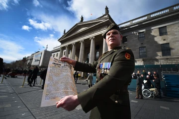Soldier holding proclamation Easter Rising