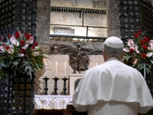 Pope Leo XIV visits the tomb of St. Francis in Assisi, Italy, on Nov. 20, 2025.