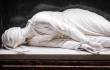 A close-up of the tomb of St. Ceclia at the basilica dedicated to her in Trastevere, Rome, Italy.