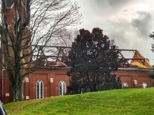 Undamaged trees surround St. Joseph Church in Vanderburgh County, which lost its roof to a severe storm that moved through the area March 3, 2023.