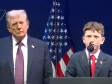Shane Encinas, 12, shown here with President Donald Trump, was among the students who recounted their experiences facing religious discrimination in American public schools at a Religious Liberty Commission hearing on Sept. 8, 2025, in Washington, D.C.